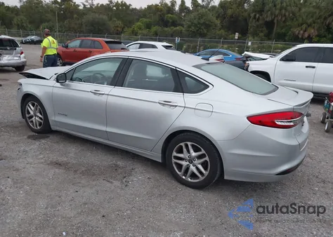 2018 Ford Fusion Hybrid Titanium from USA, damaged, VIN 3FA6P0RU5JR143495